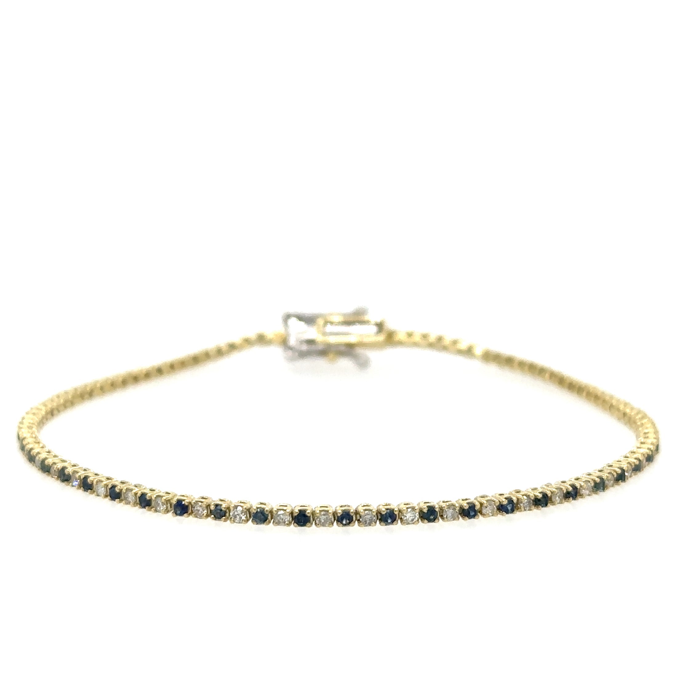 Pulsera De Tenis En Oro Amarillo De 14 Kt Con Diamantes Y Zafiro Azul De 7", 1.2 CT